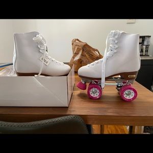 Pink and white roller skates